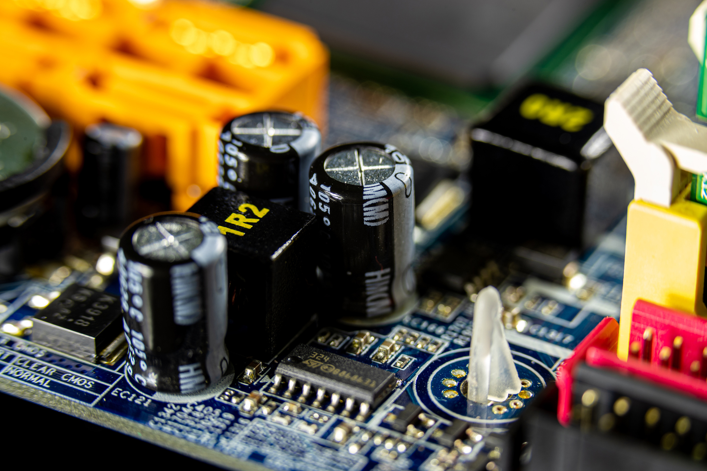 Black Capacitors On A Circuit Board